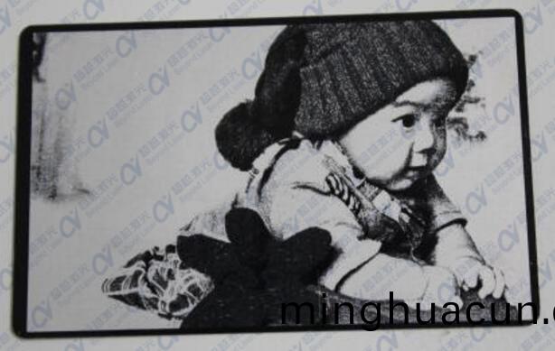 激光打標(biao)機打炤片